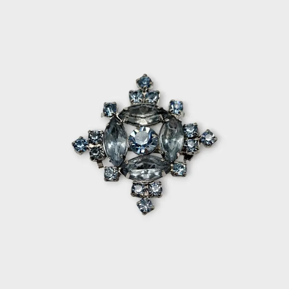 Ice Blue Starburst Rhinestone Brooch Silver Tone Mixed Cut Mid Century Cool Glam